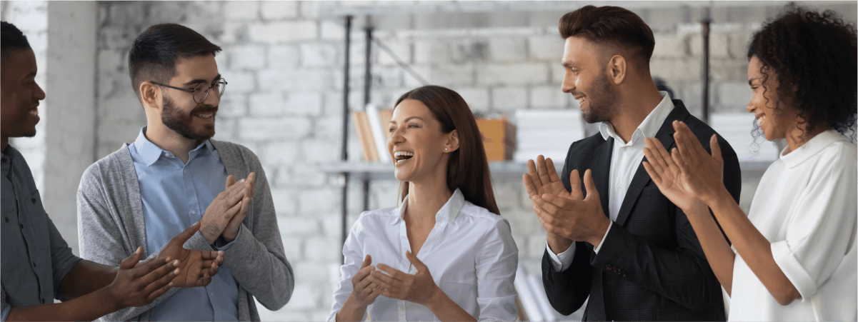 group of employees chatting with each other